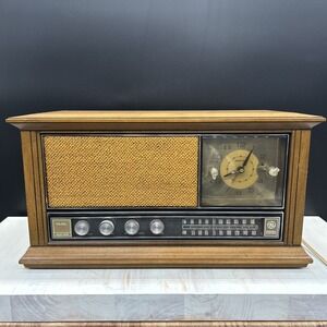 Vintage GE C2560A AM/FM Clock Radio Solid State Mid Century Pecan Wood Dual Spkr